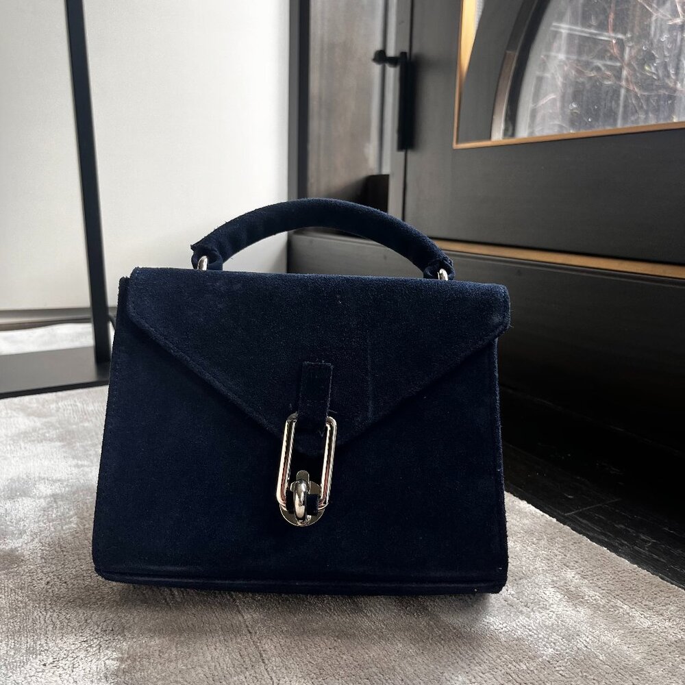 blue suede bag